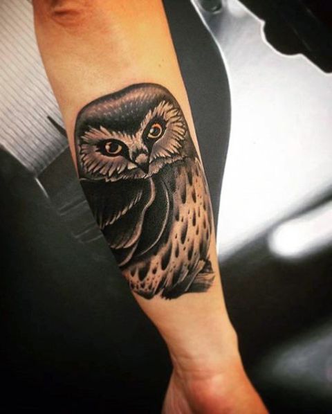 Cute owl tattoo on the outer forearm