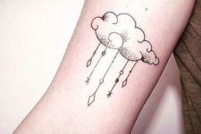 Cute small cloud tattoo on the arm