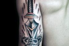 Dagger and cloud tattoo