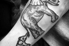 Elephant and baby elephant tattoo on the hand