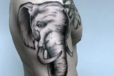 Elephant head tattoo on the arm
