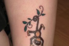Funny monkey tattoo on the leg
