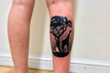 Giraffe silhouette tattoo on the leg
