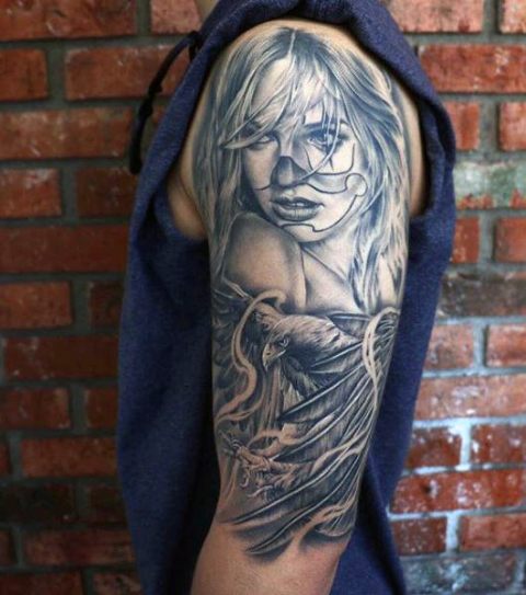Girl and eagle tattoo on the arm