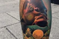 Gorgeous fish tattoo on the leg