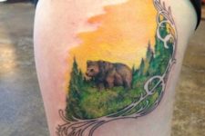 Grizzly bear tattoo on the thigh