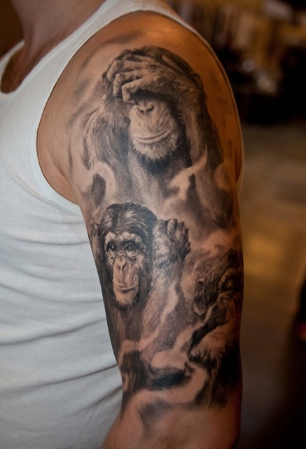 Half-sleeve monkeys tattoo