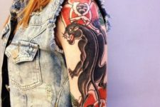 Half-sleeve panther and red flowers tattoo