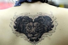 Hearted shape lion tattoo on the back