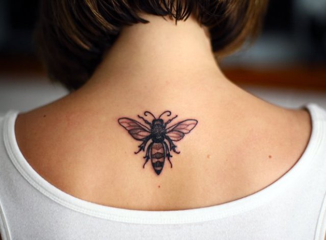 Honey bee tattoo on the neck