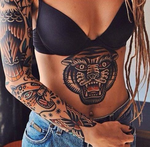 Huge panther tattoo on the stomach