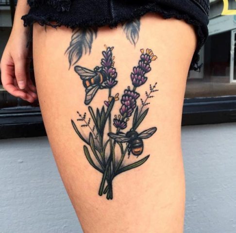 Lavender and bees tattoo on the thigh