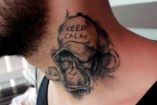 Monkey with cap tattoo on the neck