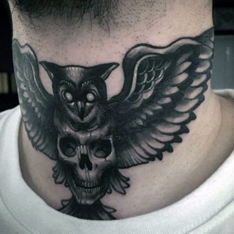 Owl and scull tattoo on the neck