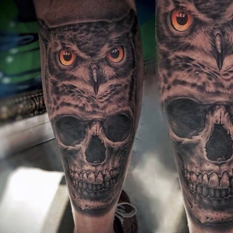 Owl and scull tattoos on the legs