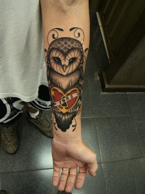 Owl tattoo with red heart and important date