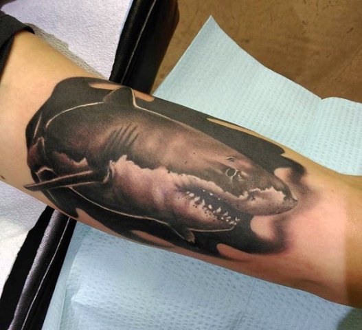 Realistic tattoo on the hand