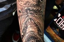 Scary shark tattoo on the arm
