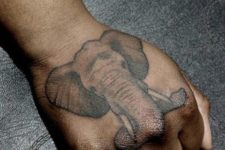 Small tattoo on the fist
