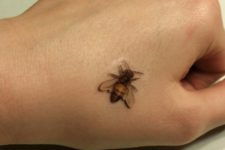 Tiny tattoo on the hand