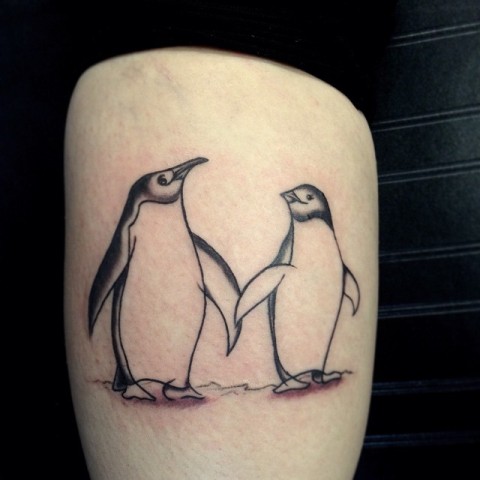 Twee schattige pinguïns tattoo