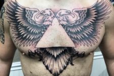 Two eagles tattoo on the chest