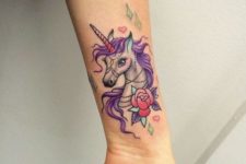 Unicorn and flower tattoo on the wrist