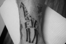 Unique giraffe tattoo with ‘believe’ word