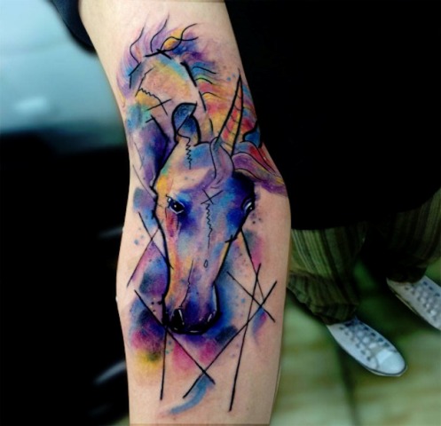 Watercolor tattoo on the hand