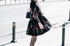 With floral dress, ankle boots and mini bag