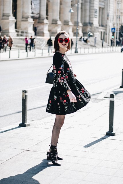 With floral dress, ankle boots and mini bag