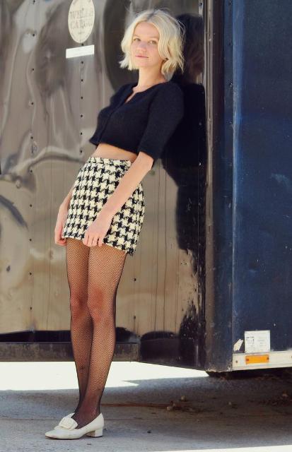 With mini skirt, crop shirt and white shoes