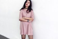 With pale pink loose dress, white socks and pink and white sneakers