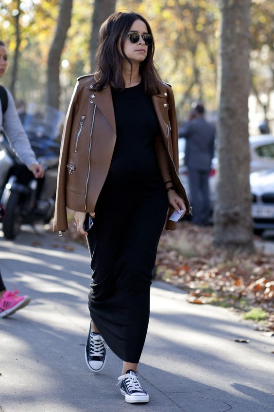 a black maxi dress, a cognac colored leather jacket and black Converse for a chic feminine look