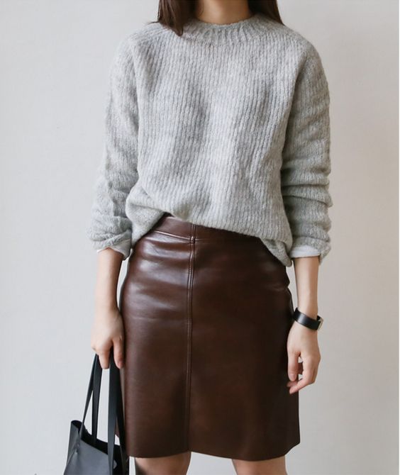 a maroon leather skirt and a grey sweater can be worn to work if there's no strict dress code