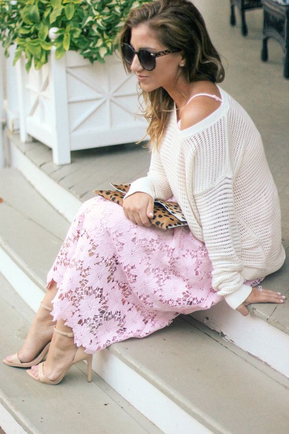 a white sweater, a pink lace midi dress, neutral heels and a leopard clutch
