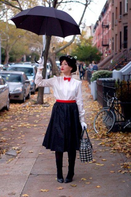 Mary Poppins costume with a black skirt, a white shirt, a red sash and a bow tie, black shoes and a black hat