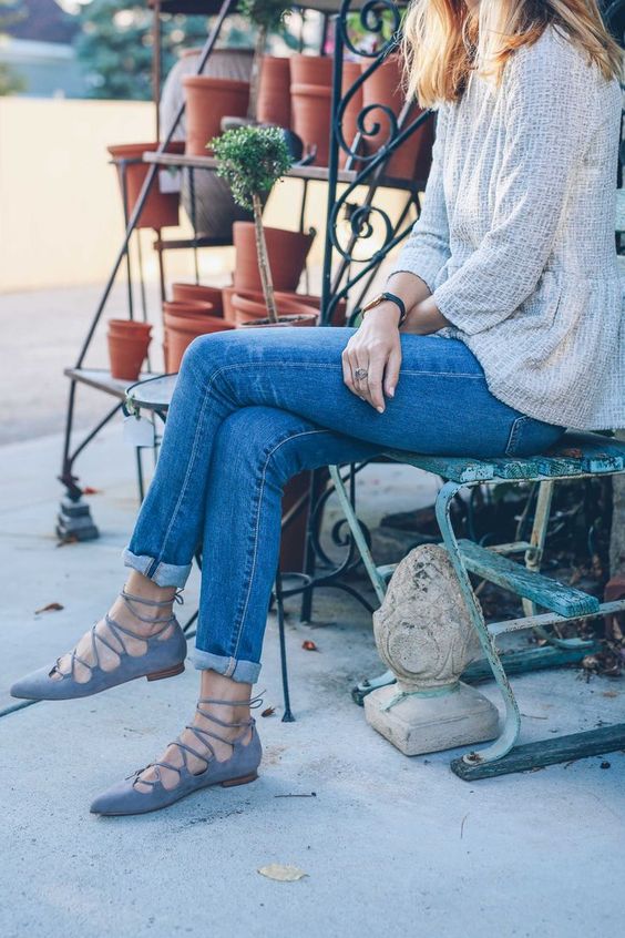blue jeans, grey lace up flats and a neutral textural top