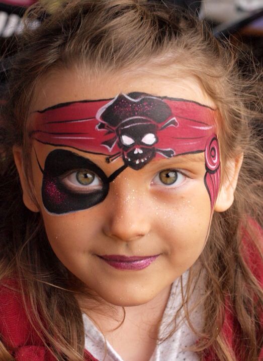 girl's pirate makeup with a painted headband and eyeband