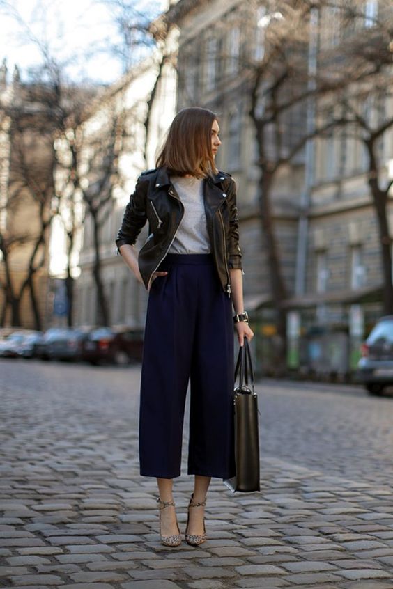 navy culottes, a grey tee, a black leather jacket and leopard print shoes for a trendy outfit