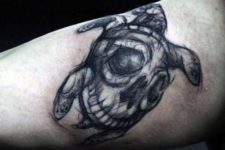 Abstract turtle and skull tattoo
