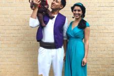 Aladdin costume for the dad, Jasmine costume for the mom and Abu costume for the kid
