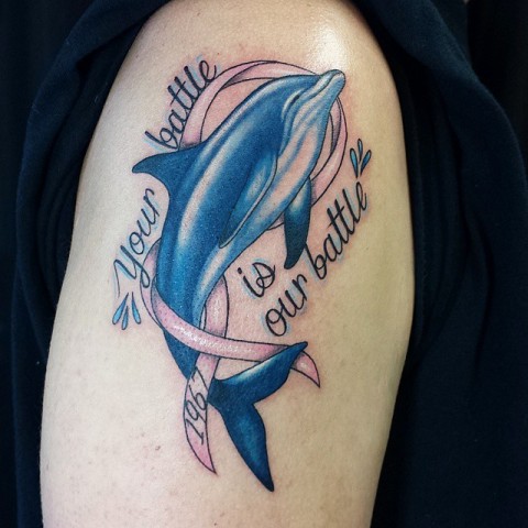 Big dolphin tattoo on the hand