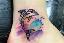 Black dolphin with colorful splashes tattoo