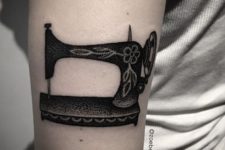 Black sewing machine tattoo idea