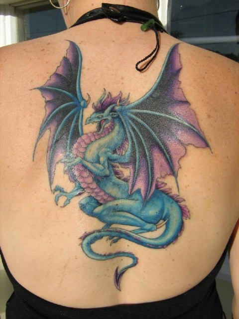 Blue and purple dragon tattoo on the back