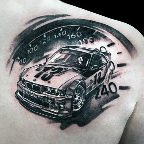 Car and techometer tattoo on the back