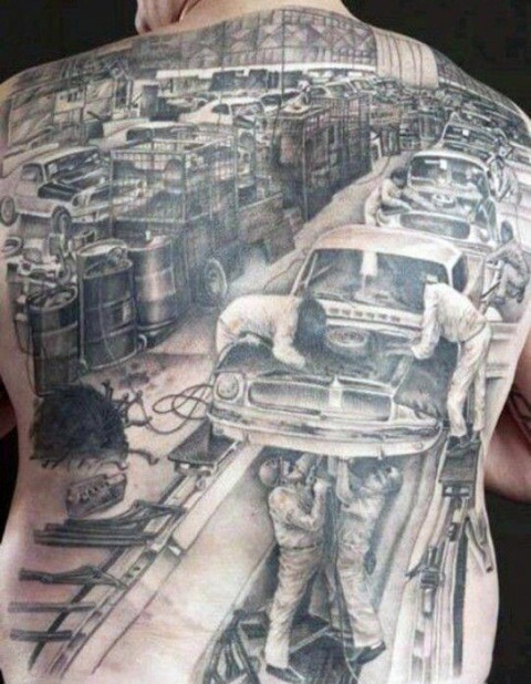 Car repair shop tattoo on the whole back