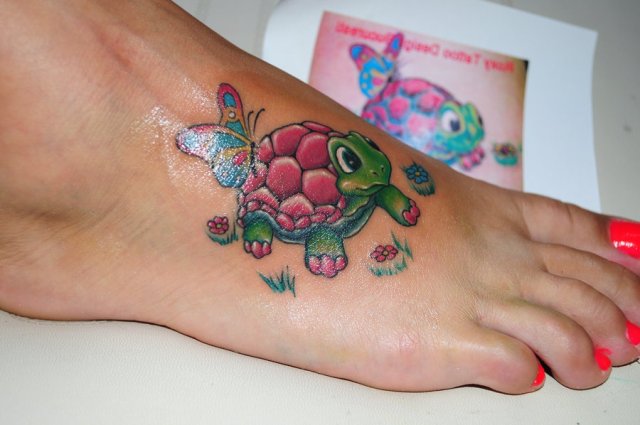 Cartoon turtle tattoo on the foot