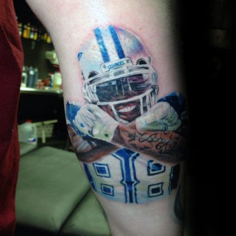 Colorful football player tattoo